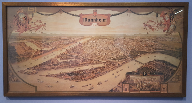 Ein gerahmtes Gemälde einer lebendigen Stadtlandschaft an einer Museumswand.