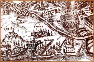 Ein rustikales Holzschild mit einer detaillierten, handgezeichneten Karte einer Stadt mit Gebäuden, Straßen und anderen Merkmalen.