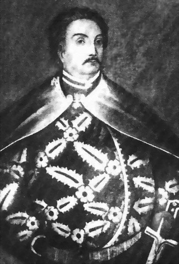 Schwarzes und weißes Foto von Papst Johannes Paul II. in Priesterrobe, der eine schwarze Robe mit weißem Kragen und Manschetten trägt und die Hände gefaltet hat, ernsthafter Gesichtsausdruck, direkter Blick.