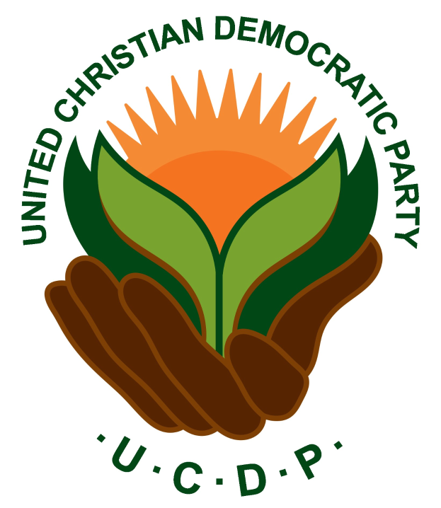 Logo der Vereinigte Christlich-Demokratische Partei (VCDP): eine Hand, die eine leuchtend gelbe Blume mit einem grünen Stiel und Blättern hält, in der Mitte eines blauen und gelben Kreises auf einem weißen Hintergrund, mit der Schrift 'VCDP' in fetter schwarzer Schrift darunter.